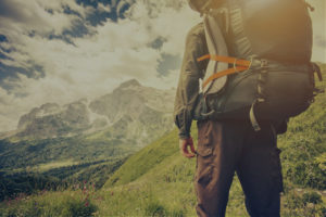 Traveler-Man-with-backpack-mountaineering-dark