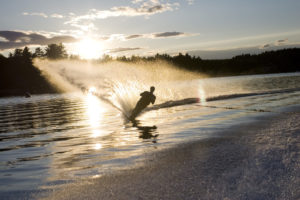 Waterskiing at sunset